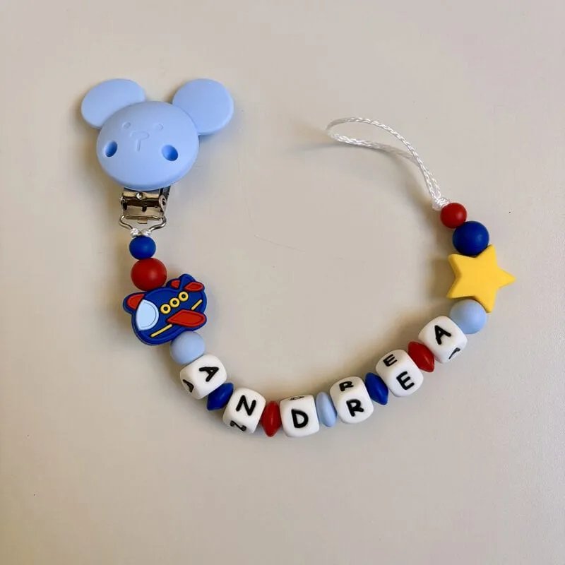 Andrea: clip a topolino azzurro, aeroplano e stella gialla